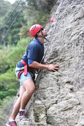 Reubean Franks scales the rock face as part of his BETA course